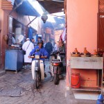 Of course you ride a motorbike in the tiny pedestrian alleys of the souks...!