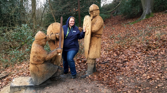 Now, now fellas, I'm taken already anyway! Wood sculptures line your route on the circuit around the ridge of the 1066 Battle of Hastings.