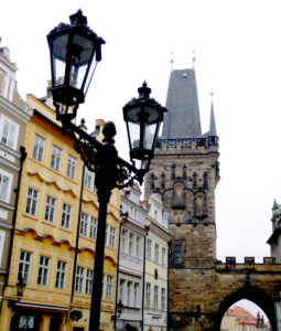 Old world lamp posts and the Old Town Bridge Tower on Charles Bridge.