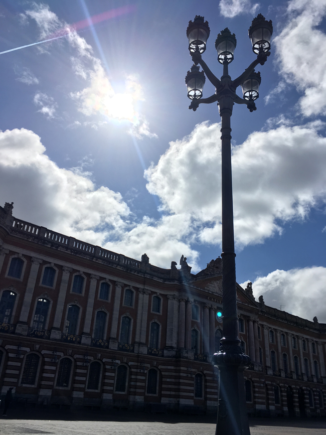 Loving the people-watching and sunshine in the Capitole Square.