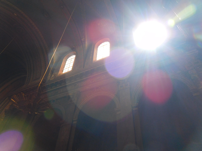 Sunshine struggling to brighten the ancient, brooding interior of Notre-Dame de la Daurade.