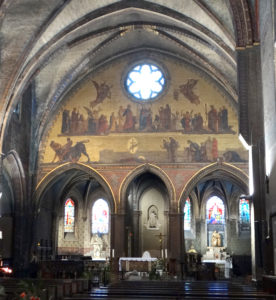 The painted tableau above the alter depicts St Sernin's martyrdom after being dragged behind the bull (taur).
