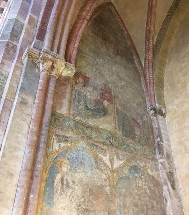 Original paintings uncovered under the whitewash at the Church of the Jacobins.