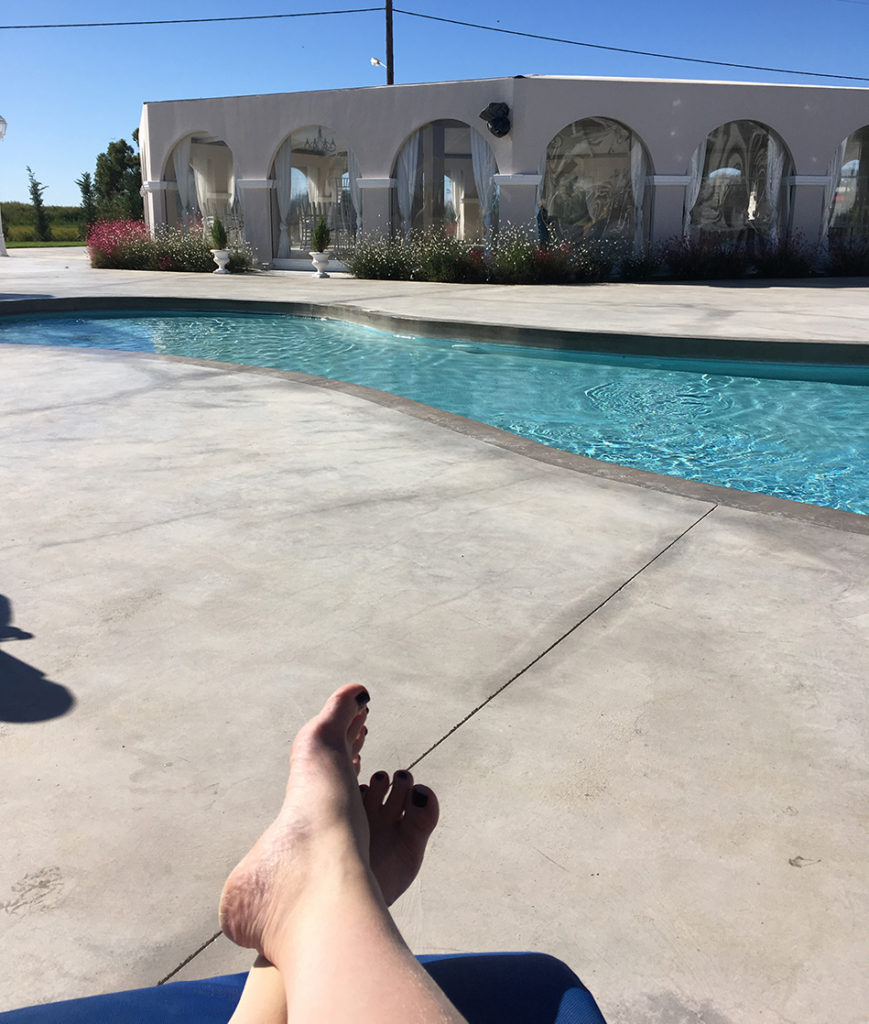 The deserted pool deck at the Venus Hotel, Kalamaki