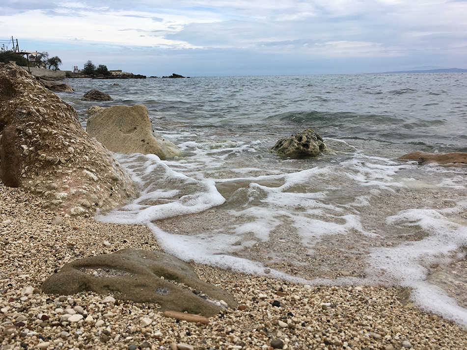 Wading in the waves at Kryoneri